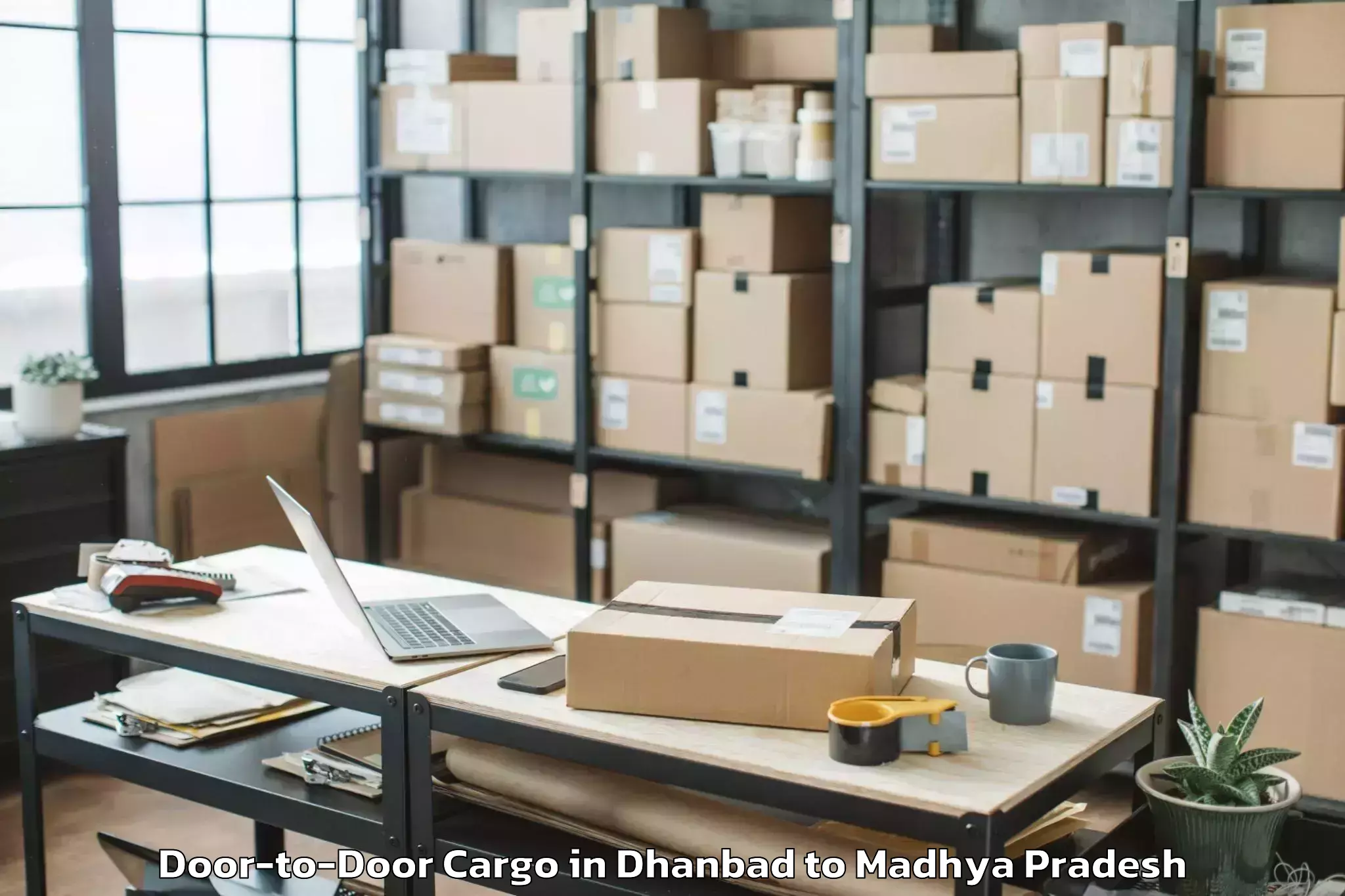 Book Your Dhanbad to Manpur Door To Door Cargo Today